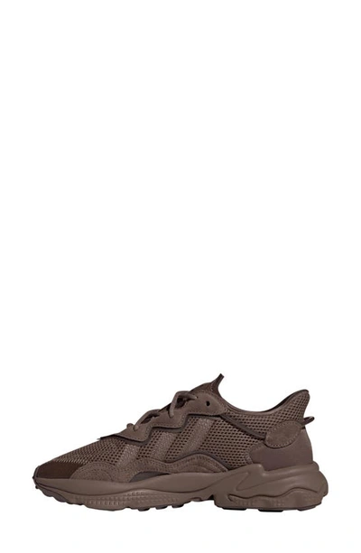 Shop Adidas Originals Ozweego Sneaker In Strata/ Earth/ Dark Brown