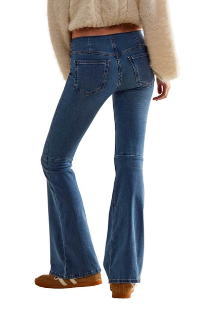 Shop Free People Penny Pull-on Flare Jeans In Blue Sea