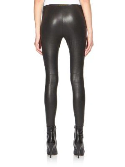 Shop Saint Laurent Lambskin Leather Leggings In Black