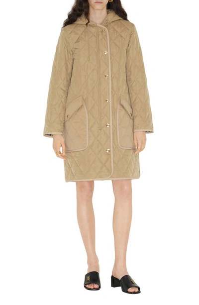 Shop Burberry Roxby Quilted Hooded Long Jacket In Archive Beige