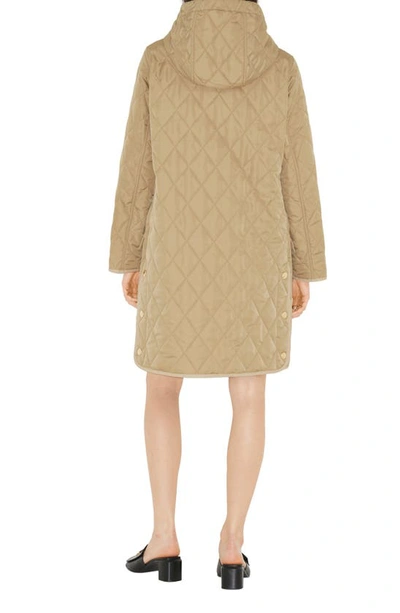 Shop Burberry Roxby Quilted Hooded Long Jacket In Archive Beige