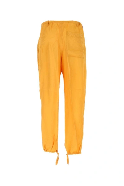 Shop Dries Van Noten Pants In Yellow