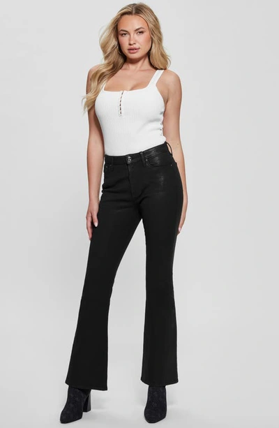 Shop Guess Sexy Coated Flare Jeans In Jet Black Multi