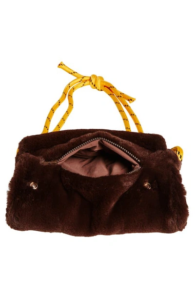 Shop Kkco Faux Fur Muff Crossbody Bag In Cocoa