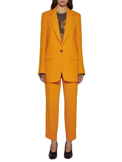 Shop Dries Van Noten Trousers In Orange