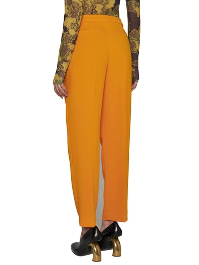 Shop Dries Van Noten Trousers In Orange
