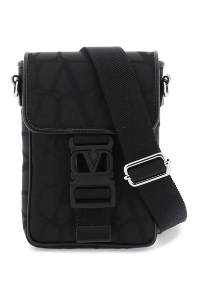 Shop Valentino Garavani Black Iconographe Mini Crossbody Bag