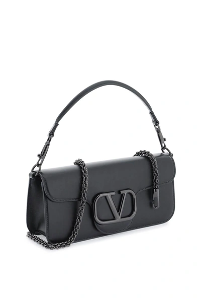 Shop Valentino Garavani Locò Handbag