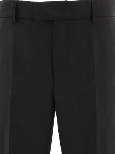 Shop Dolce & Gabbana Technical Fabric Pants With Metal Dg Logo In Black