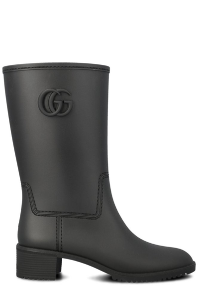 Shop Gucci Logo Plaque Boots In Black