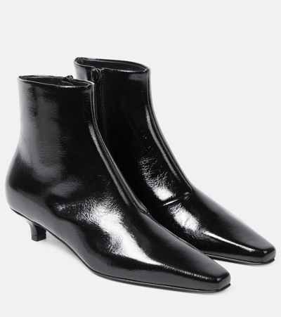 Shop Totême The Slim Leather Ankle Boots In Black