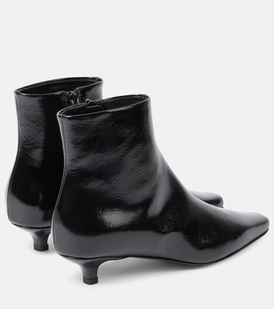 Shop Totême The Slim Leather Ankle Boots In Black