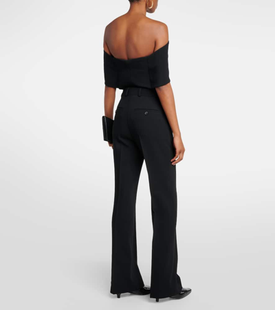 Totême High-rise Pleated Crêpe Flared Pants In Black