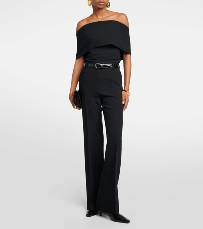 Totême High-rise Pleated Crêpe Flared Pants In Black