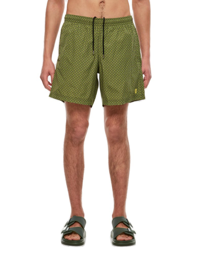 Shop Alexander Mcqueen Spotted Skull Printed Swim Shorts In Green