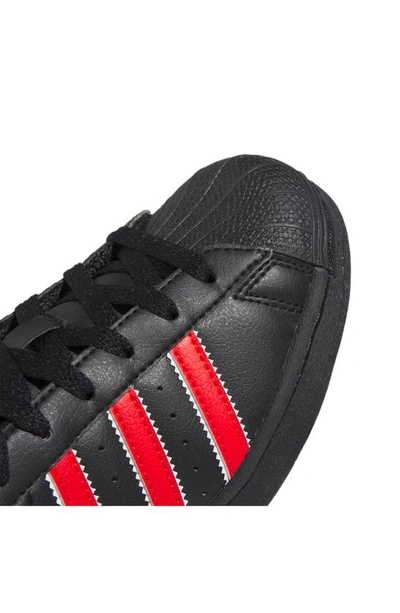 Shop Adidas Originals Kids' Superstar Sneaker In Black/ Red/ White