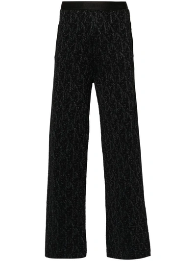 Shop Palm Angels Knitted Flared Trousers In Black Black