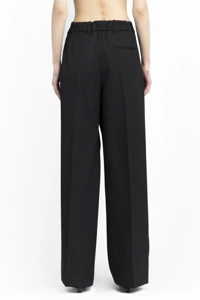 Shop The Row Trousers In Black