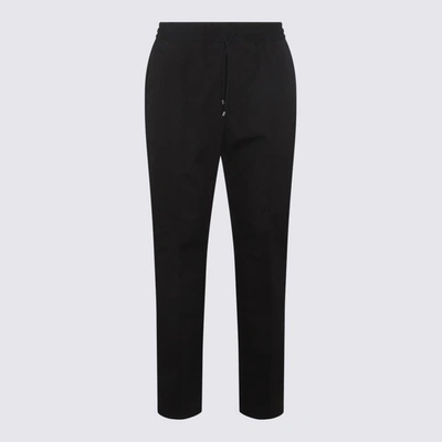 Shop Valentino Trousers Black