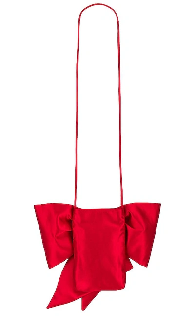Shop Loeffler Randall Violet Bow Crossbody Bag In Red Satin