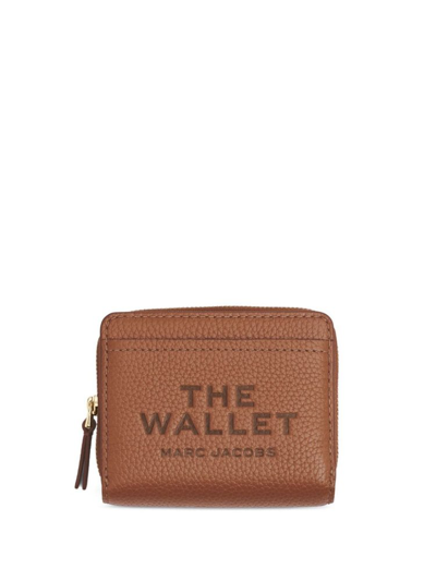 Shop Marc Jacobs Logo Printed Zipped Mini Compact Wallet In Brown