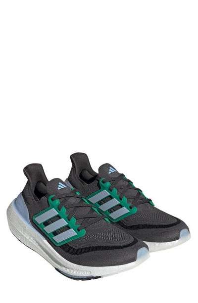 Shop Adidas Originals Ultraboost 23 Running Shoe In Carbon/ Blue Dawn/ Court Green