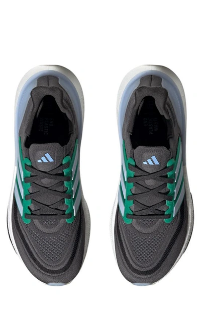 Shop Adidas Originals Ultraboost 23 Running Shoe In Carbon/ Blue Dawn/ Court Green