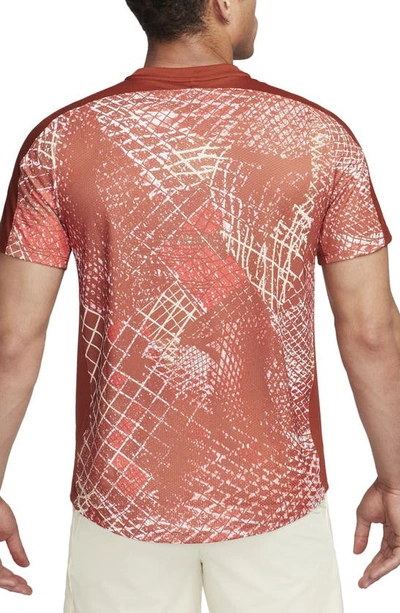 Shop Nike Court Victory Abstract Print Dri-fit Tennis T-shirt In Rugged Orange/ White