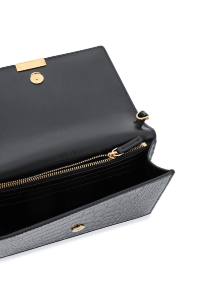 Shop Versace Croco-embossed Leather Greca Goddes Crossbody Bag In Black