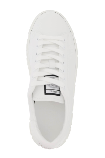 Shop Versace Greca Sneakers In White