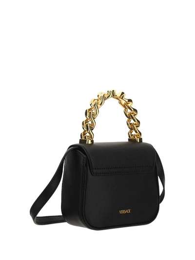 Shop Versace Handbags In Nero/oro