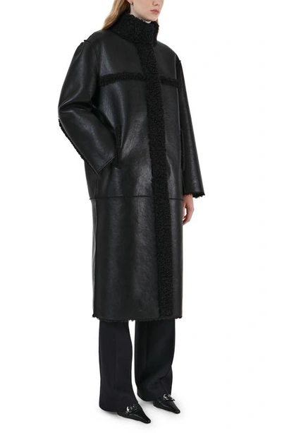 Shop Apparis Tilly Reversible Faux Shearling & Faux Leather Long Coat In Noir