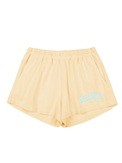 Shop Sporty And Rich Sporty & Rich Slogan Printed Elasticated Waistband Shorts In Yellow