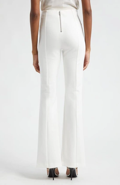 Shop Alice And Olivia Emiko Split Cuff High Waist Flare Pants In Off White