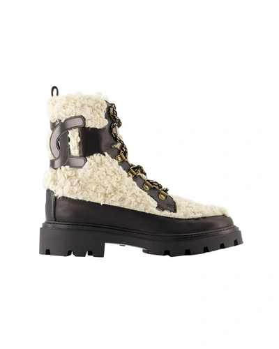 Shop Tod's Gomma Catena Boots -  - Leather - Black In Beige