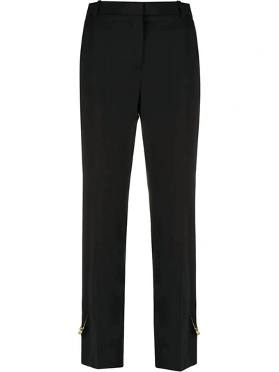 Shop Versace Safety Pin Trousers In Black