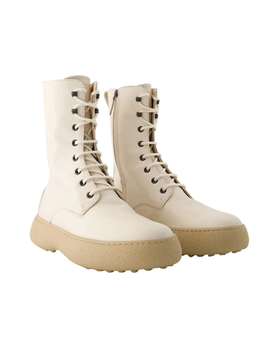 Shop Tod's Winter Gommini Boots -  - Leather - White
