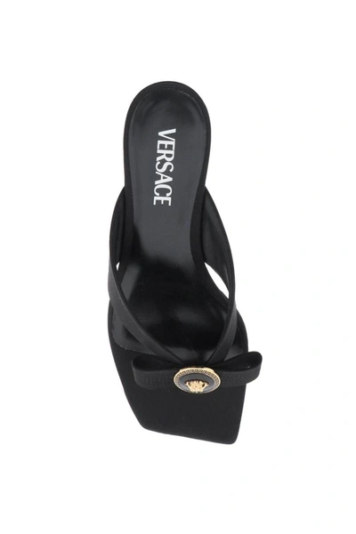 Shop Versace Gianni Ribbon Thong Mules In Black