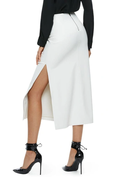 Shop Alice And Olivia Maeve Back Slit Faux Leather Midi Skirt In Off White