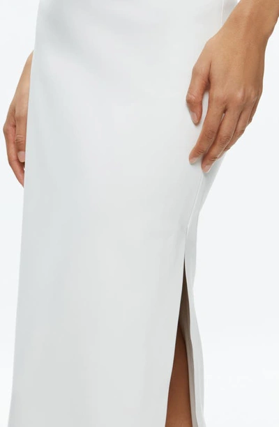 Alice And Olivia Maeve Back Slit Faux Leather Midi Skirt In Off White