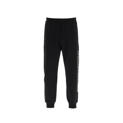 Shop Alexander Mcqueen Logo Cotton Pants In Black