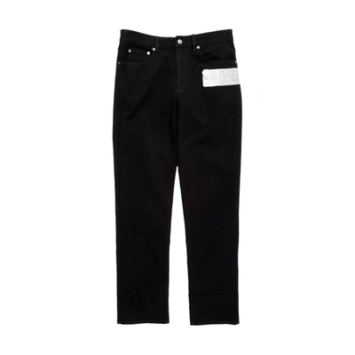 Shop Givenchy Logo Cotton Jeans In Black