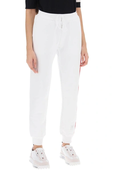 Shop Thom Browne Joggers With Tricolor Bands