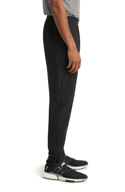 Shop Alo Yoga Co-op Performance Joggers In Black
