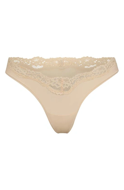 Shop Skims Fits Everybody Lace Thong In Sand