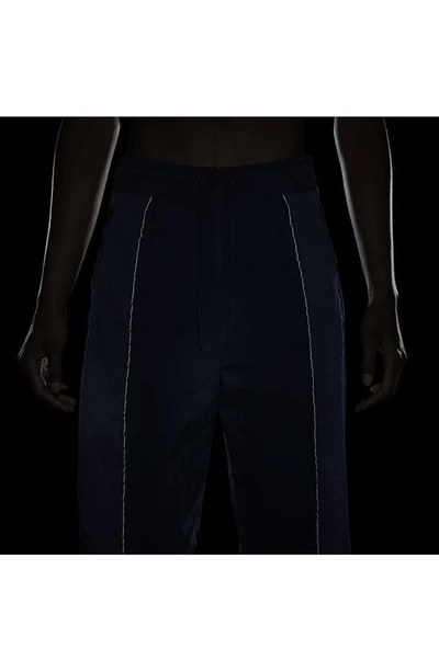 Shop Nike Running Division Water Repellent High Waist Pants In Diffused Blue