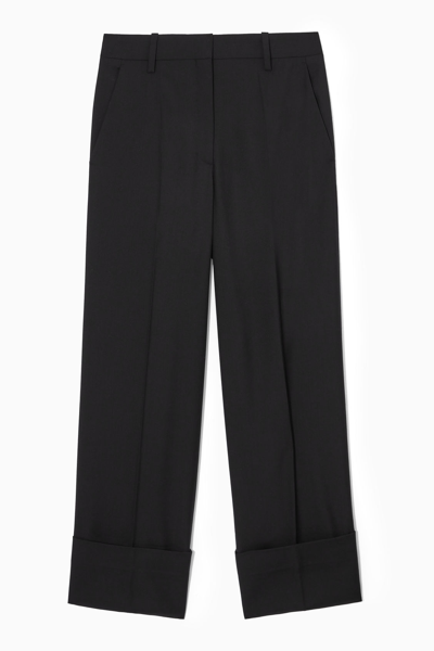 Shop Cos Turn-up Wide-leg Wool Trousers In Black