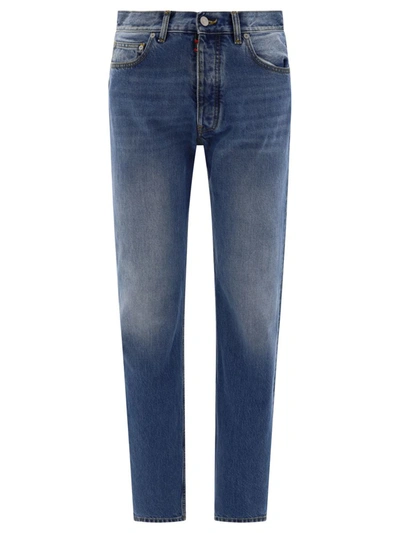 Shop Maison Margiela Embroidered Logo Jeans In Blue