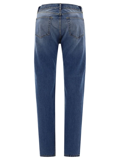 Shop Maison Margiela Embroidered Logo Jeans In Blue