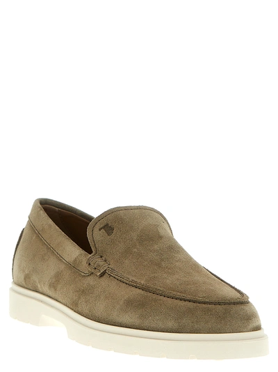 Shop Tod's Pantofola Loafers Beige